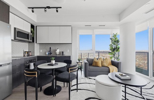 The Queensway Apartment | Modern 2BR Retreat with Private Balcony & Parking