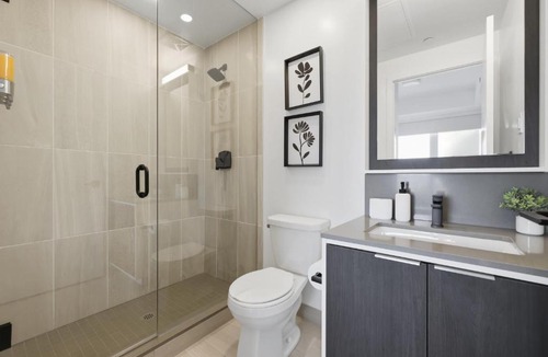 The Queensway Apartment | Modern 2BR Retreat with Private Balcony & Parking