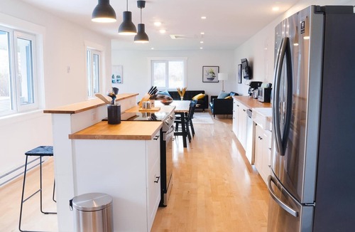 Margaree Forks House | Modern style home with spectacular views of the Margaree River.