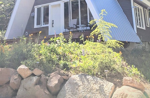 Comox Valley Cabin | Mountain oasis, Custom timber A-frame with hot tub and fire pit. Pet friendly.
