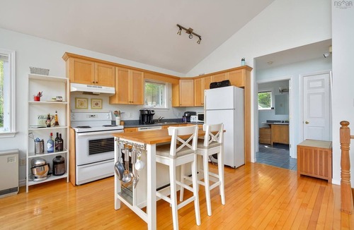 Englishtown Cottage | Oceanview Cottage on Cabot Trail - Main Level