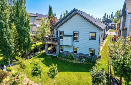 Okotoks House | On Golf Course + Walkout + Private Entry + AC