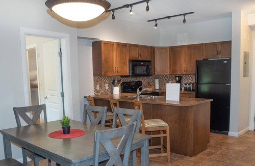 South Pandosy Condo | Perfect for families - 2 Bedroom with den, Ground floor walks out to grassy area