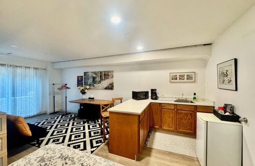West Vancouver House | Private guest room with separate washroom and entrance