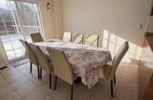 Brampton House | Private Queen Bedroom with Walk-In Closet, TV & Mini Fridge in Brampton Shared Home - 3 Baths, Full Kitchen, WiFi, Laundry & Deck - Near GO Station, Ideal for Work & Study!