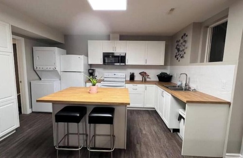 Langley House | Renovated two-bedroom basement suite. Close to the mountains, city, and ocean.