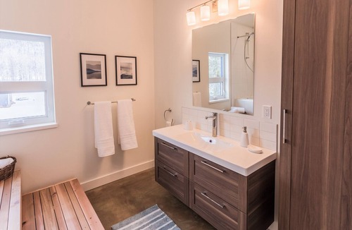 Fernie House | Riverfront! Private hot tub and mountain views! Close to the ski hill & town!
