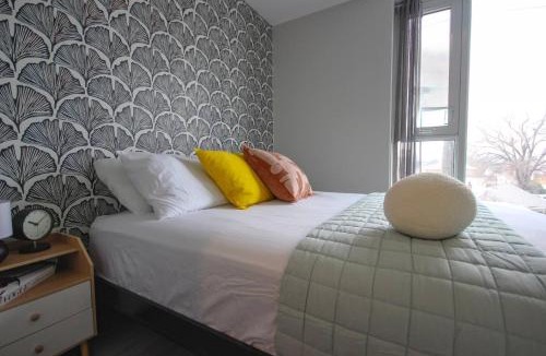 The Queensway House | Safari Luxe 3 Bedroom Designer Condo Near Downtown