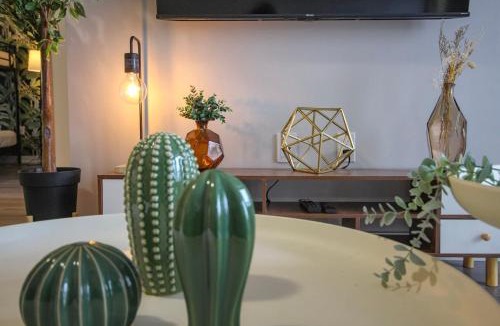 The Queensway House | Safari Luxe 3 Bedroom Designer Condo Near Downtown