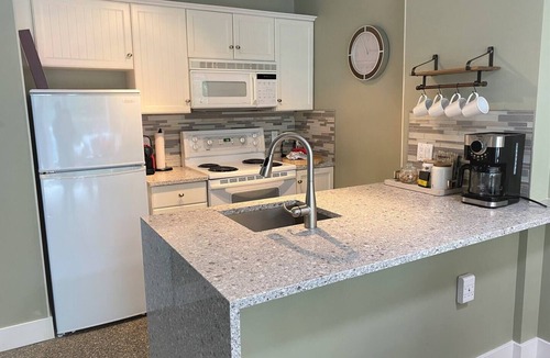 Upper Village Condo | Slope-side condo ski in ski out! Quiet side of resort, heated pool + 3 hot tubs