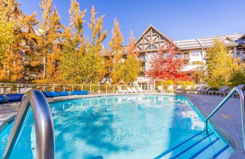 Upper Village Condo | Slope-side condo ski in ski out! Quiet side of resort, heated pool + 3 hot tubs