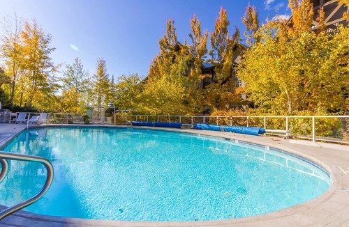 Upper Village Condo | Slope-side condo ski in ski out! Quiet side of resort, heated pool + 3 hot tubs