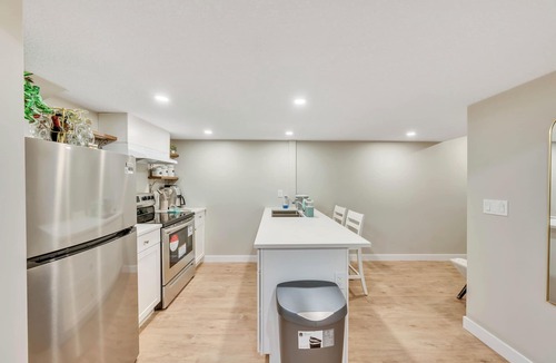West Edmonton House | Spacious 3-Bedroom Suite, Steps from West Edmonton Mall