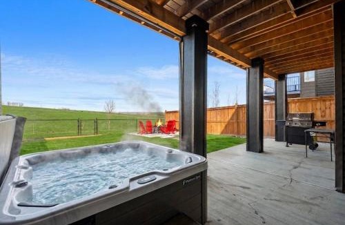 Springbank House | Spacious Family Retreat with Hot Tub, Pool Table, Gym