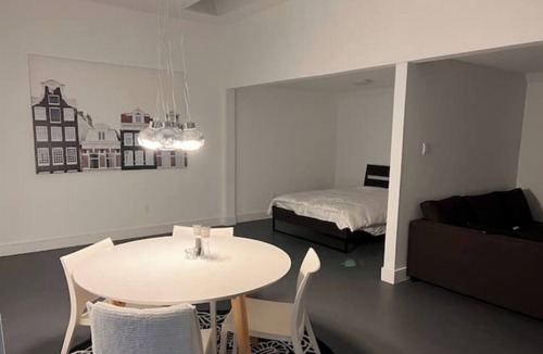 Halifax Apartment | Spacious guest suite with sitting area