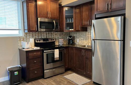 Panorama Hills Apartment | Spacious Private Cozy Walkout Entire Suite Close to Airport, Downtown, Shops, Stampede & Rocky Mountains with many Amenities in Panorama Hills NW - 4 Can Sleep