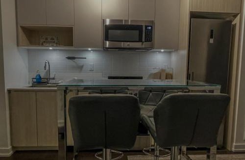 The Queensway Apartment | Stylish New 1BR in Toronto with Fast WiFi and Private Workspace