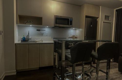 The Queensway Apartment | Stylish New 1BR in Toronto with Fast WiFi and Private Workspace