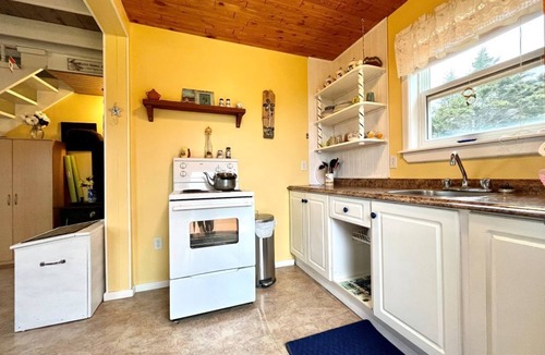Grand Beach Cabin | Take it easy at this tranquil getaway, only steps from the beach!