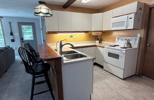 Dysart et al Cottage | The Darling Dockside - Little Kennisis Lake Waterfront Retreat Level Lot