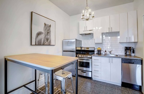 Plateau Mont Royal Apartment | Top-Floor Balcony Overlooking Mont-Royal Ave Cafés