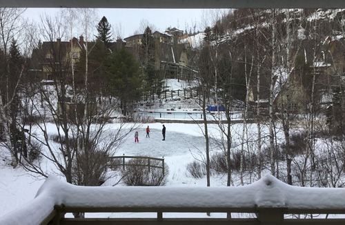 Mont-Tremblant Condo | Tremblant, ski in/out, 4 bedroom, sleeps 8, big pool, 2 decks + fire pit + pond