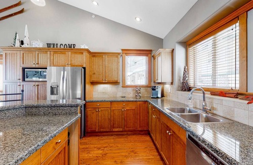 Big White Ski Resort Condo | True ski-in/ski-out 4-bedroom condo with private hot tub at Big White