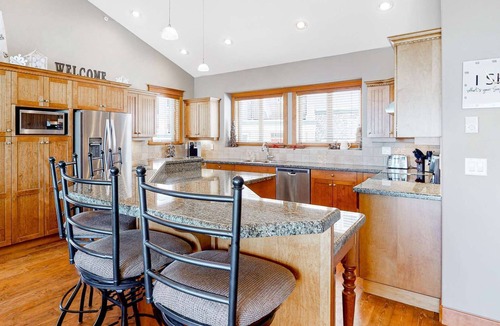 Big White Ski Resort Condo | True ski-in/ski-out 4-bedroom condo with private hot tub at Big White