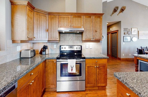 Big White Ski Resort Condo | True ski-in/ski-out 4-bedroom condo with private hot tub at Big White