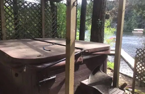 Shawnigan Lake Cottage | Unique Hand built log cottage on the lake with views and hot tub.