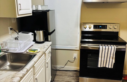 Southwest Calgary House | Upper Floor Private 1-Bedroom Suite with Parking