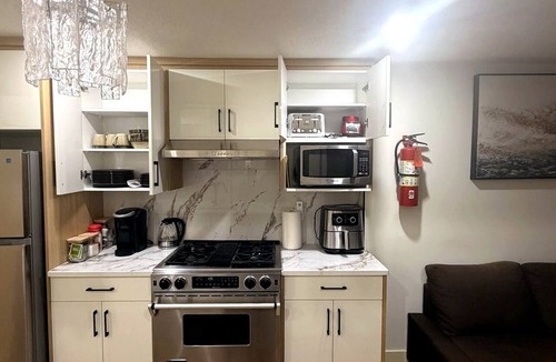 Southwest Calgary Apartment | Upscale Basement Suite - Private Entry Sleeps 4.