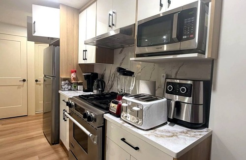 Southwest Calgary Apartment | Upscale Basement Suite - Private Entry Sleeps 4.