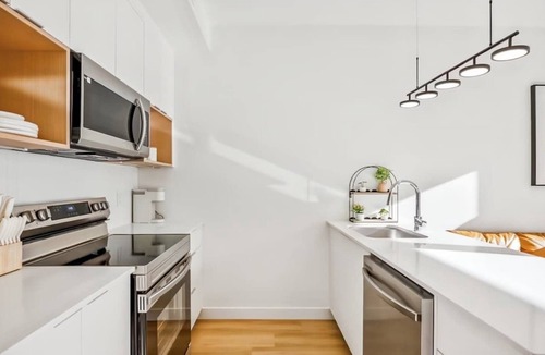 Mount Pleasant Apartment | Urban Luxury Suite | Pool Table, Sauna + DT Calgary Views