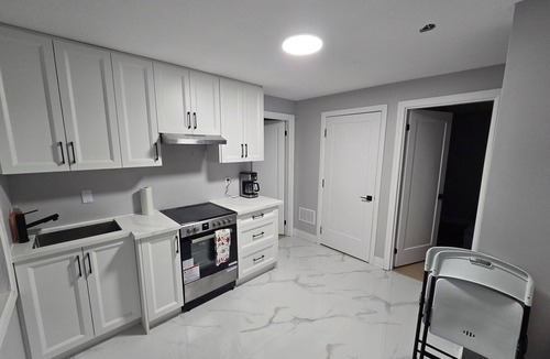 Niagara Falls Apartment | Walk to the Falls! 2BR Modern Home Base + Free Parking & Laundry