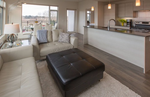 Saanich West Condo | WOW! Floor to Ceiling Windows, Mountain And Lake Views