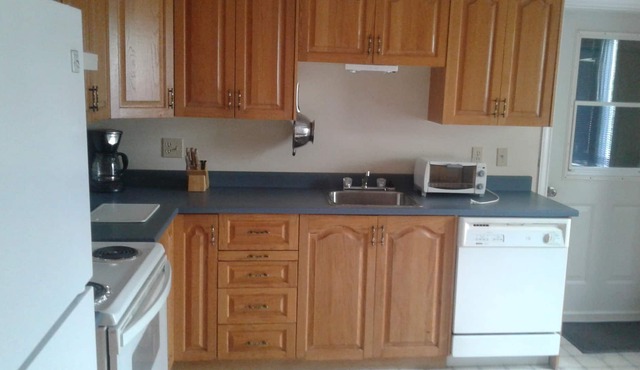 !/2 of ranch style all one level house with attached garage. Open concept .