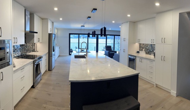 Amazing private lakeside home with beach and private dock