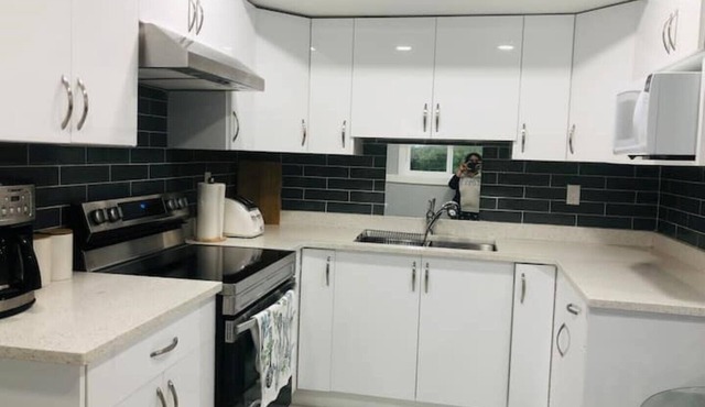 An adorable 2 BR suite with own kitchen & laundry