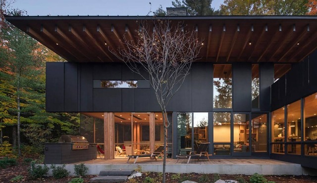 Award-winning lakeside cabin on 99 acres with private trails