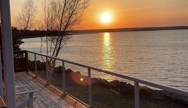Beautiful two-bedroom waterfront cottage. Unbelievable Sunsets.