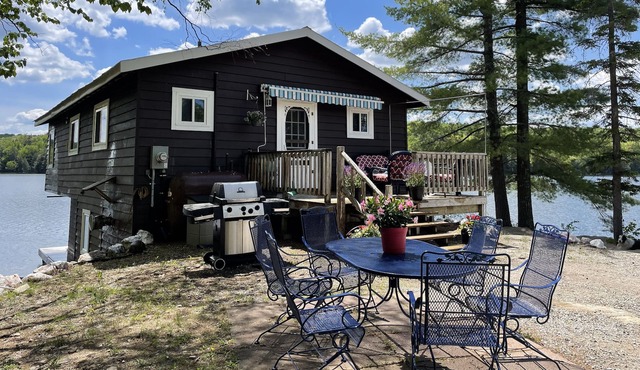 Boathouse Cottage on the water, access to snowmobile trails and ice fishing.