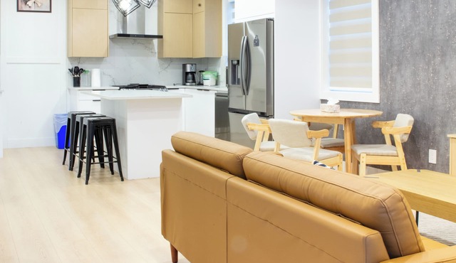Brand-new 4 BR, family-friendly duplex is your home away from home in Vancouver!