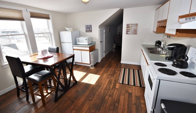 Bright One Bedroom Suite Has Peaked Ceilings with Tons of Character