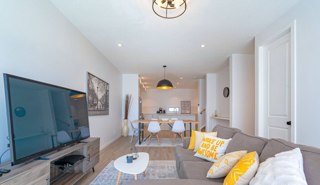 Central, Family-sized 3 BR Townhome with AC, Work Space & Private Parking