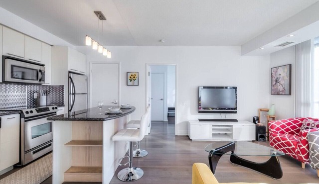 Chic 2BR Condo w/City Views, Balcony & WiFi
