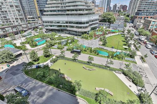 Cozy 1BR Condo with Balcony and Parking