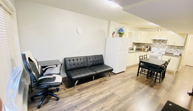 Elegant 2 bedroom 1 washroom private suite with laundry and parking