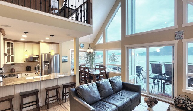 Exclusive lakefront 2-bedroom + loft cottage with high-end finishes, 3 queen beds, and a sofa bed. Dog-friendly