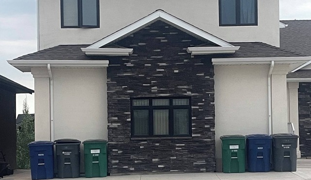 Executive 1BR+Den Walk-Out Suite Backing Park